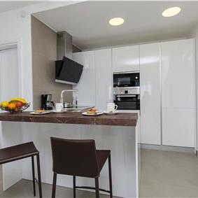 5 bedroom beachfront villa with heated pool near Omis, sleeps 9